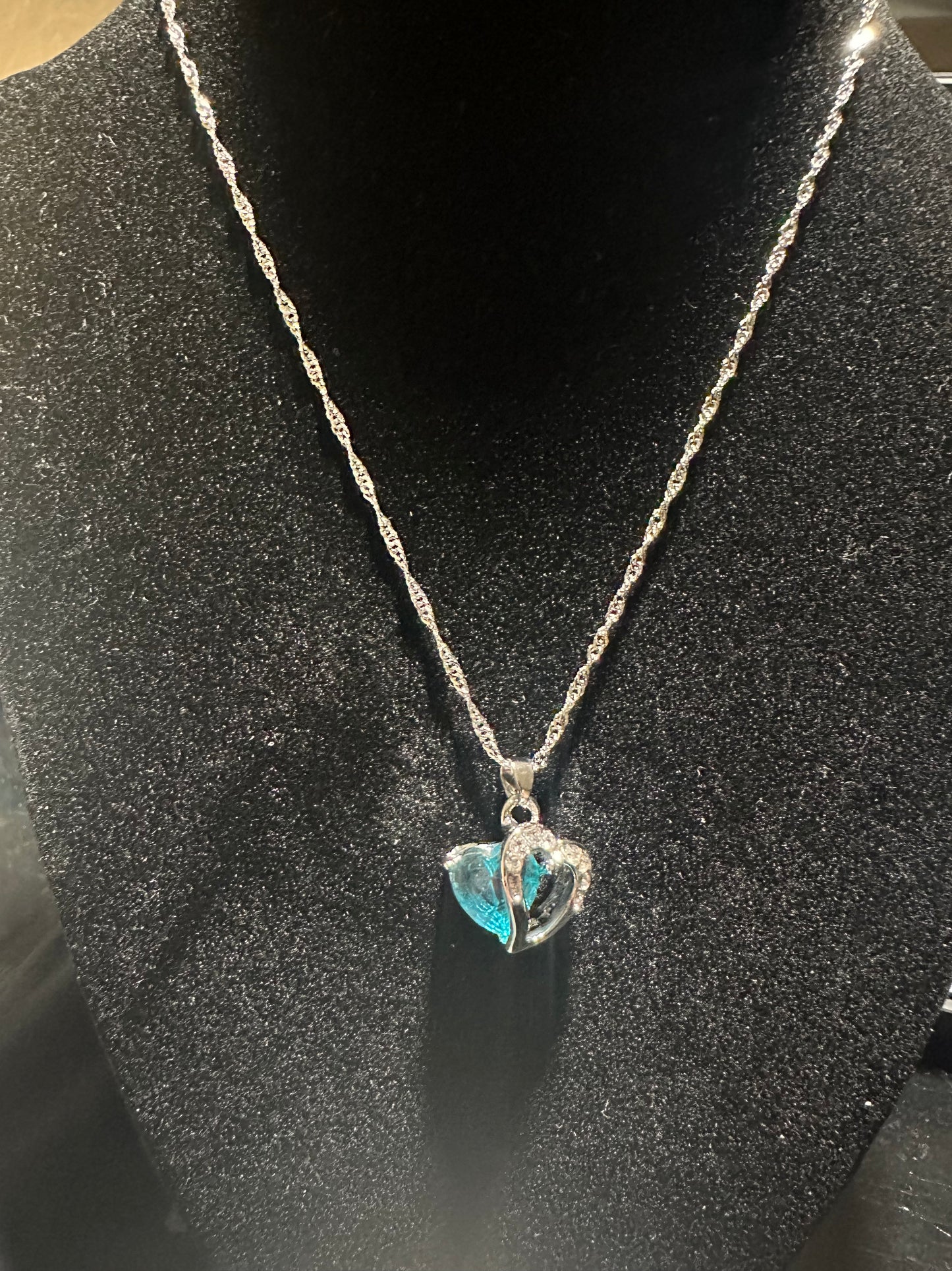 Lake blue heart pendant necklace.